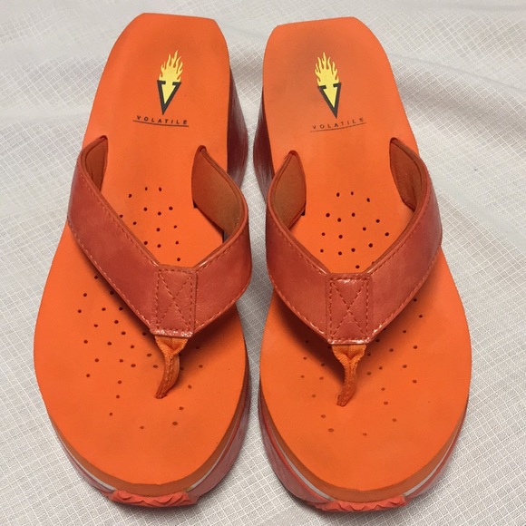 Orange Volatile sandals/flip flops.